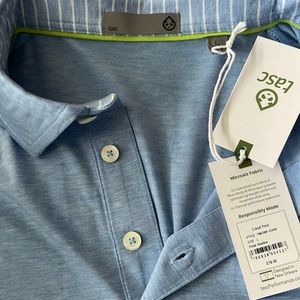 NWT Short sleeve golf polo tasc brand light blue size large